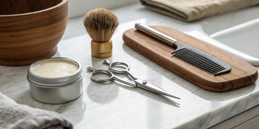A men's beard grooming kit containing essential tools like a brush, comb, scissors, and beard balm.