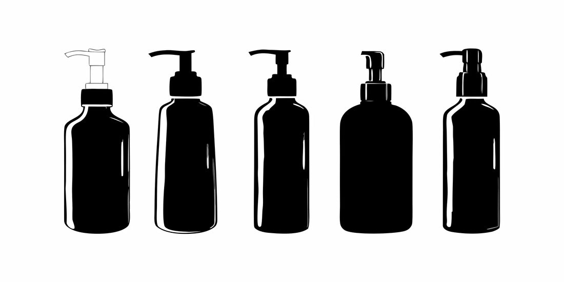 A selection of gentle face cleansers for men in dark pump bottles.
