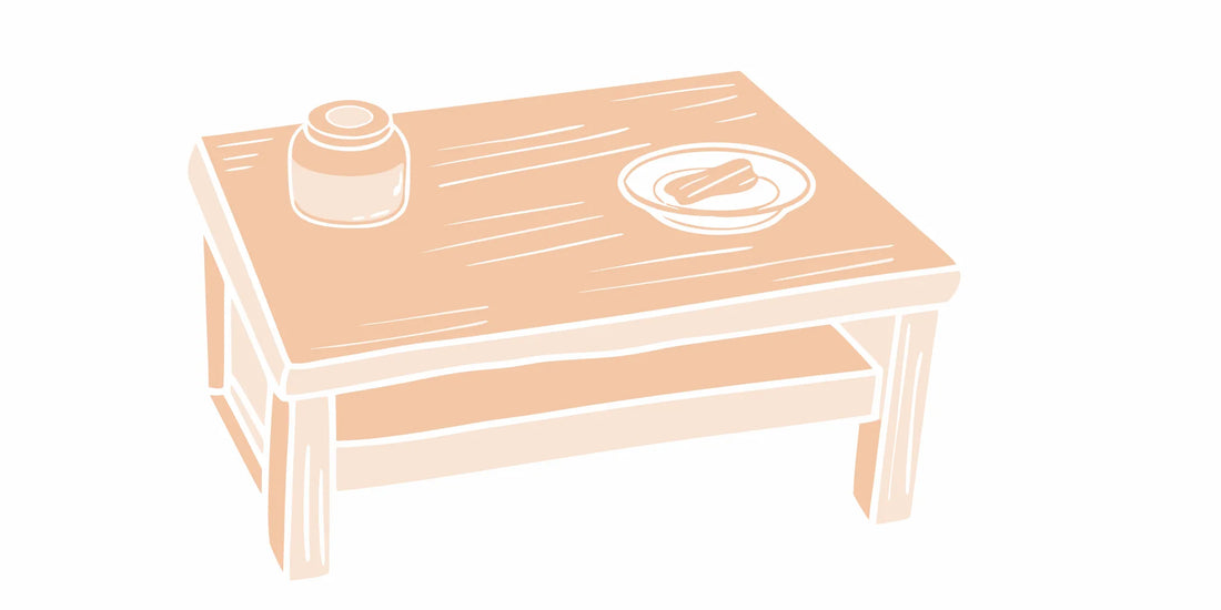Craftsman's table with natural beef tallow beard balm in a warm American workshop