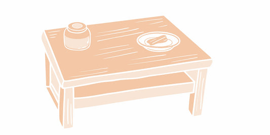 Craftsman's table with natural beef tallow beard balm in a warm American workshop