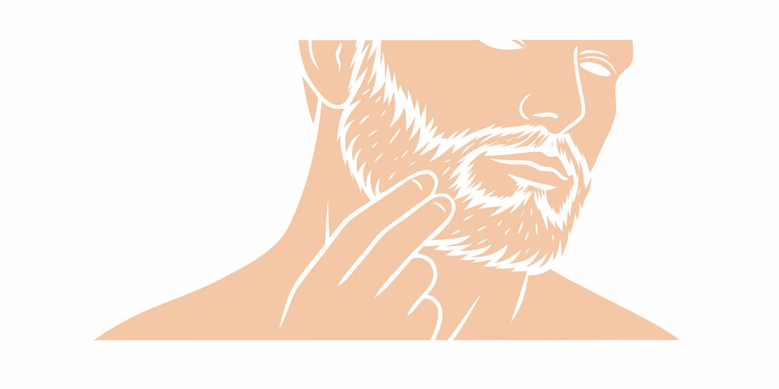 Close-up of a man with a healthy thick beard touching his jaw