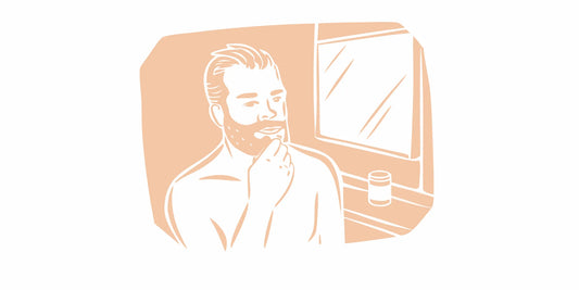 Man applying beef tallow beard balm to a well-groomed coarse beard