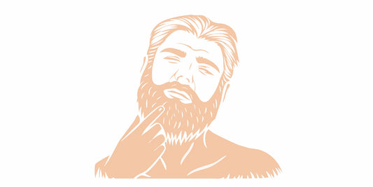 Bearded man caring for his beard outdoors