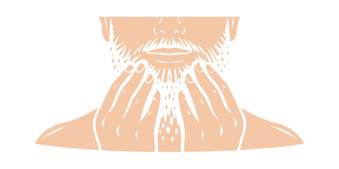A man washing his beard using a gentle technique for sensitive skin.