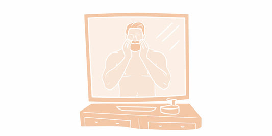 Bearded man using a hydrating face wash to clean his face and beard.