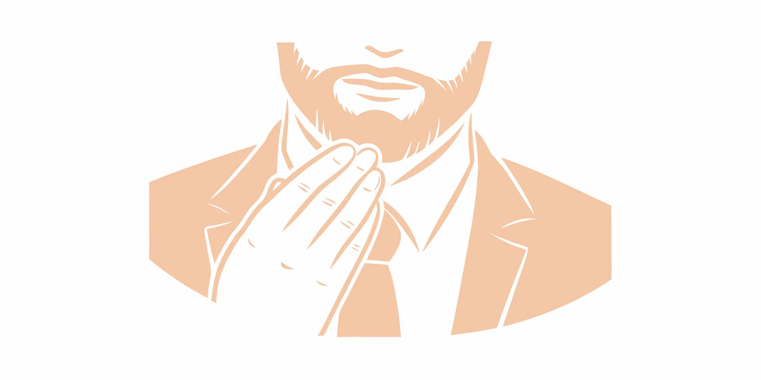 Well-groomed man applying a beard balm that absorbs quickly for a non-greasy finish.